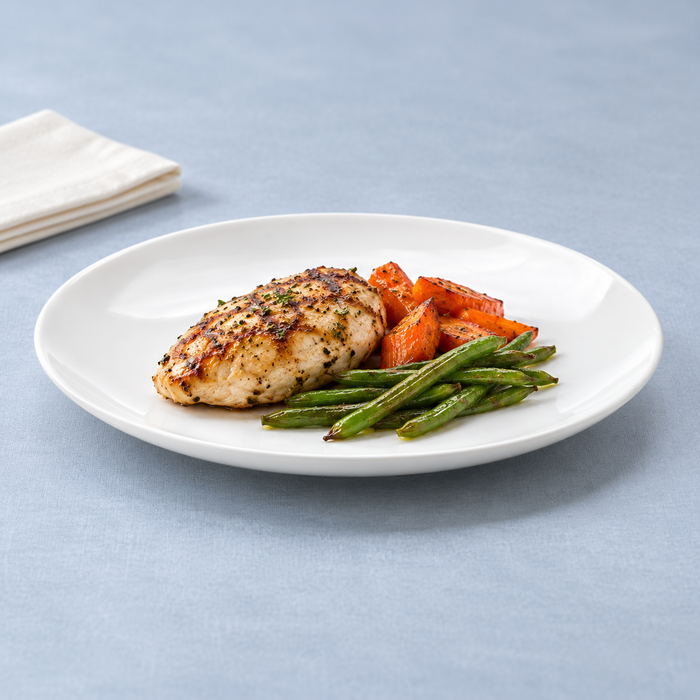 11-7/8" Round Plate, White Ceramic. Chicken entree serving suggestion.