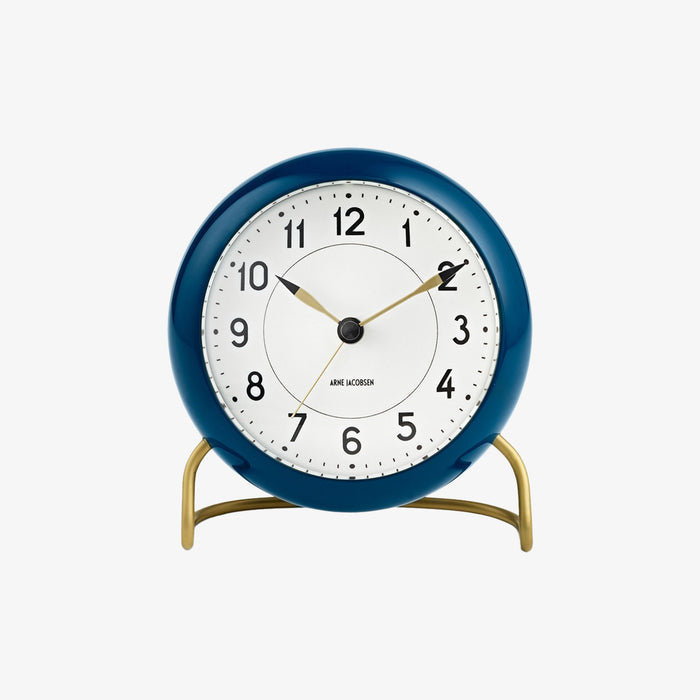 Arne Jacobsen Station Table Clock in Teal on a white background